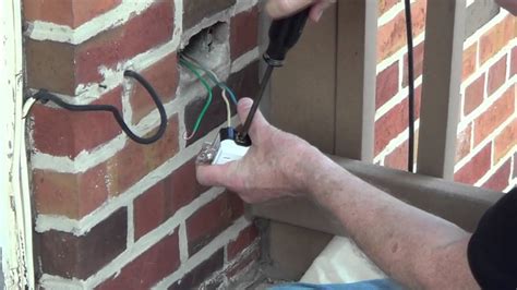 electrical wire through brick wall